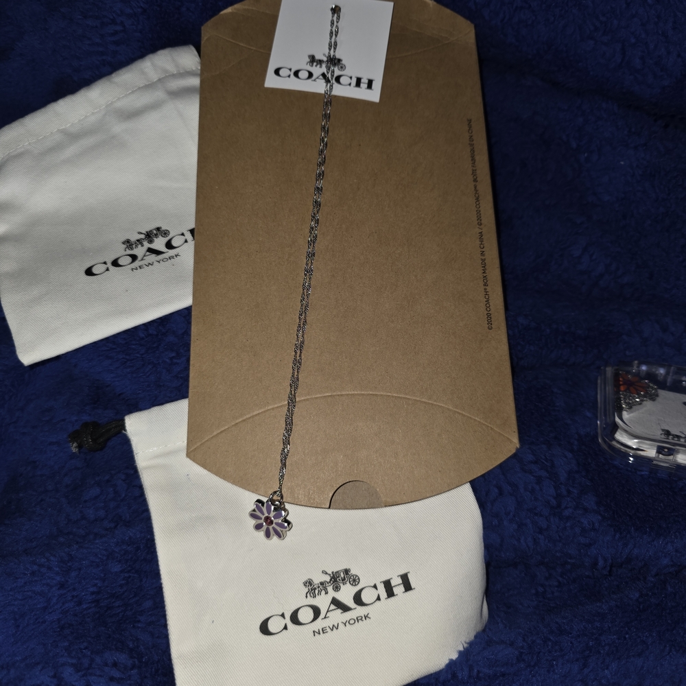 Coach Purple Daisy Pendant Necklace with Pink Crystal Accent - Picture 2 of 5